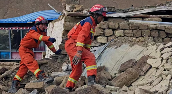 Rescue workers after earthquake hit Tibet