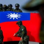 Soldiers and the Taiwanese flag