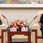 Sean Lien, vice chairman of the Kuomintang, and Song Tao, director of China's Taiwan Affairs Office