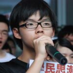 Joshua Wong protesting in Hong Kong