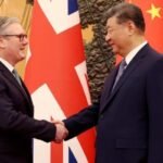 Keir Starmer and Xi Jinping shake hands