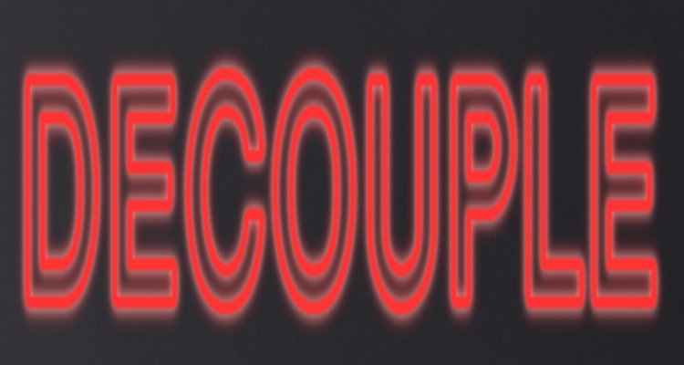 Neon sign saying DECOUPLE