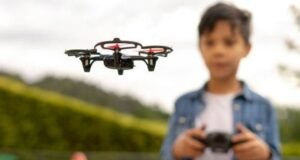 Boy flying a drone