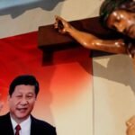 Xi Jinping on a poster next to Jesus Christ on a cross