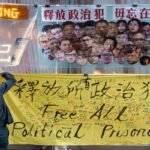 Banner saying Free All Political Prisoners