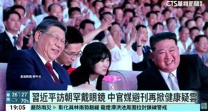 Xi wearing glasses in Pyongyang in North Korea