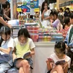 Asian children in a bookstore