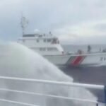 China Coast Guard vessel 21581 fires a water cannon at a Philippine vessel