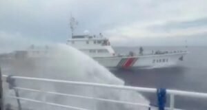 China Coast Guard vessel 21581 fires a water cannon at a Philippine vessel