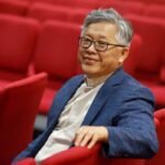 Pastor Ezra Jin Mingri looking content in 2018