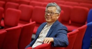 Pastor Ezra Jin Mingri looking content in 2018