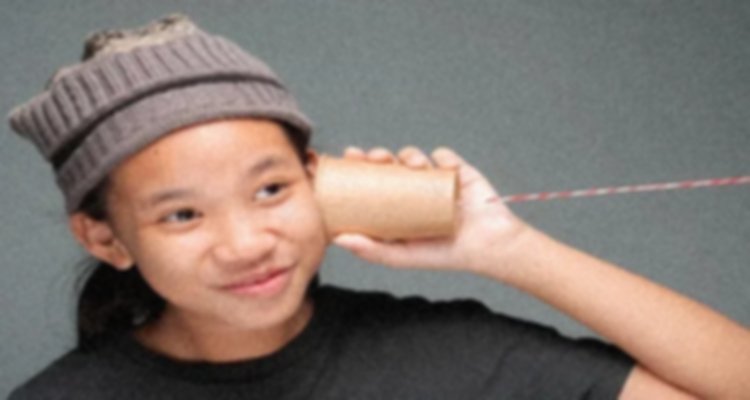 Primitive telecommunication with cup and string