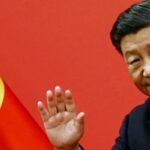 Xi Jinping waves to humanity's shared future