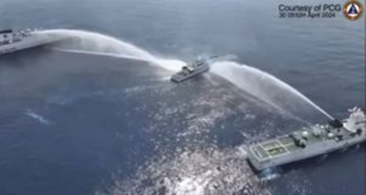 China Coast Guard fires water cannons at Philippine Vessels
