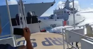 Cutter CCG 3104 deploying water cannon