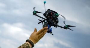 Hand and drone