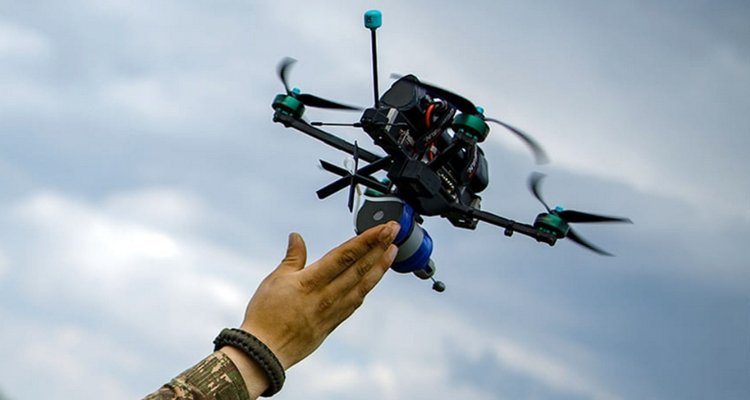 Hand and drone