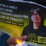 Lighting a Candle Is Not a Crime flyer showing Chow Hang-tung