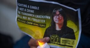 Lighting a Candle Is Not a Crime flyer showing Chow Hang-tung