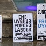 Signs opposing Uyghur forced labor