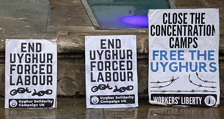 Signs opposing Uyghur forced labor