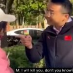 Chinese man threatens Chinese protester
