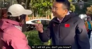 Chinese man threatens Chinese protester