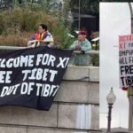 Protesters flourish No Welcome for Xi sign