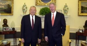 Tung Chee-hwa and Bill Clinton