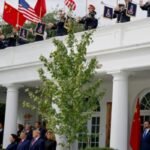 U.S. flags and Chinese flags