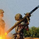 Chinese soldier firing man-portable air defense system